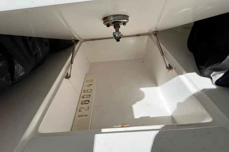  Yacht Photos Pics Storage compartment of a 2016 SeaHunter 35 Tournament boat, showing interior details.