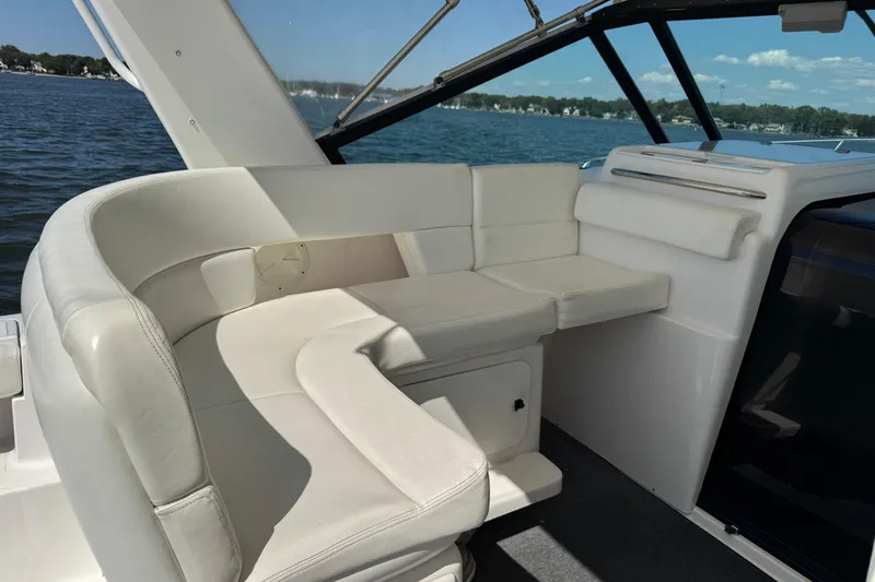  Yacht Photos Pics Luxurious seating area on a 2001 Tiara 31 Open yacht, overlooking serene waters.