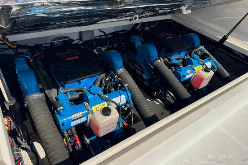  Yacht Photos Pics Twin Crusader engines in a 2001 Tiara 31 Open boat engine compartment.