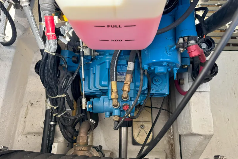  Yacht Photos Pics Engine compartment of a 2001 Tiara 3100 Open boat, showing fluid reservoir and wiring.