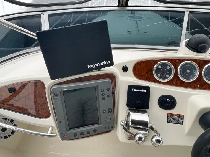 Good Times Yacht Photos Pics Control panel of 2004 Meridian 459 Motoryacht with Raymarine navigation equipment.