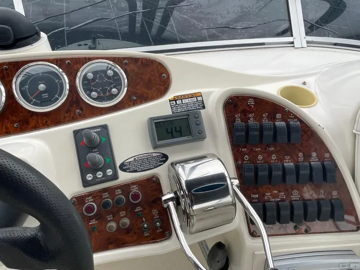 Good Times Yacht Photos Pics Control panel of a 2004 Meridian 459 Motoryacht with gauges and switches.