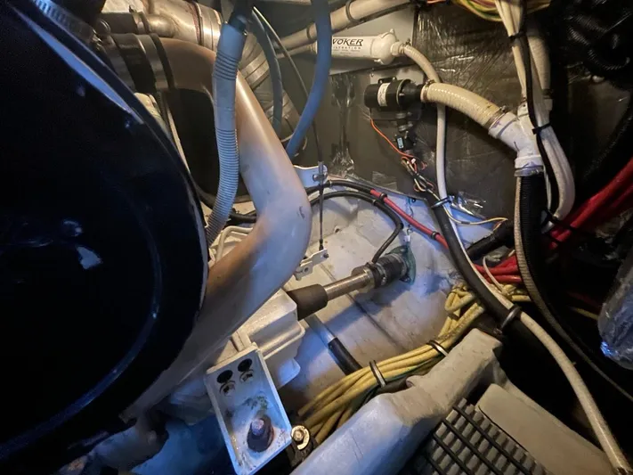 Good Times Yacht Photos Pics Engine room of 2004 Meridian 459 Motoryacht, showcasing mechanical components and wiring.