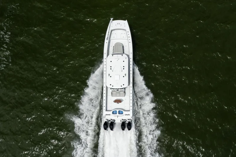  Yacht Photos Pics Aerial view of 2025 Freeman 42 LR boat cruising on water.