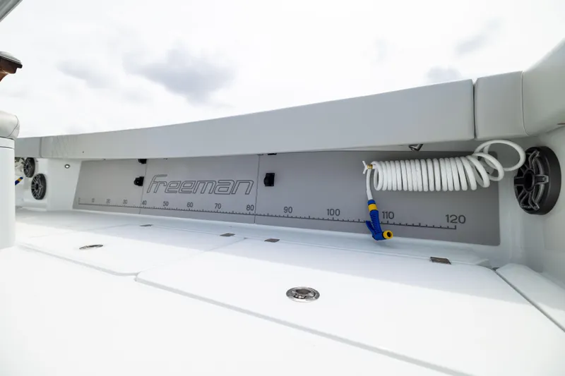  Yacht Photos Pics Freeman 42 LR 2025 boat deck with measuring scale and coiled hose.