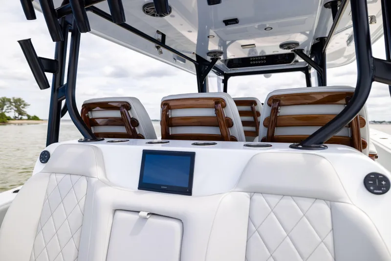  Yacht Photos Pics 2025 Freeman 42 LR boat interior with luxurious seating and modern dashboard on the water.