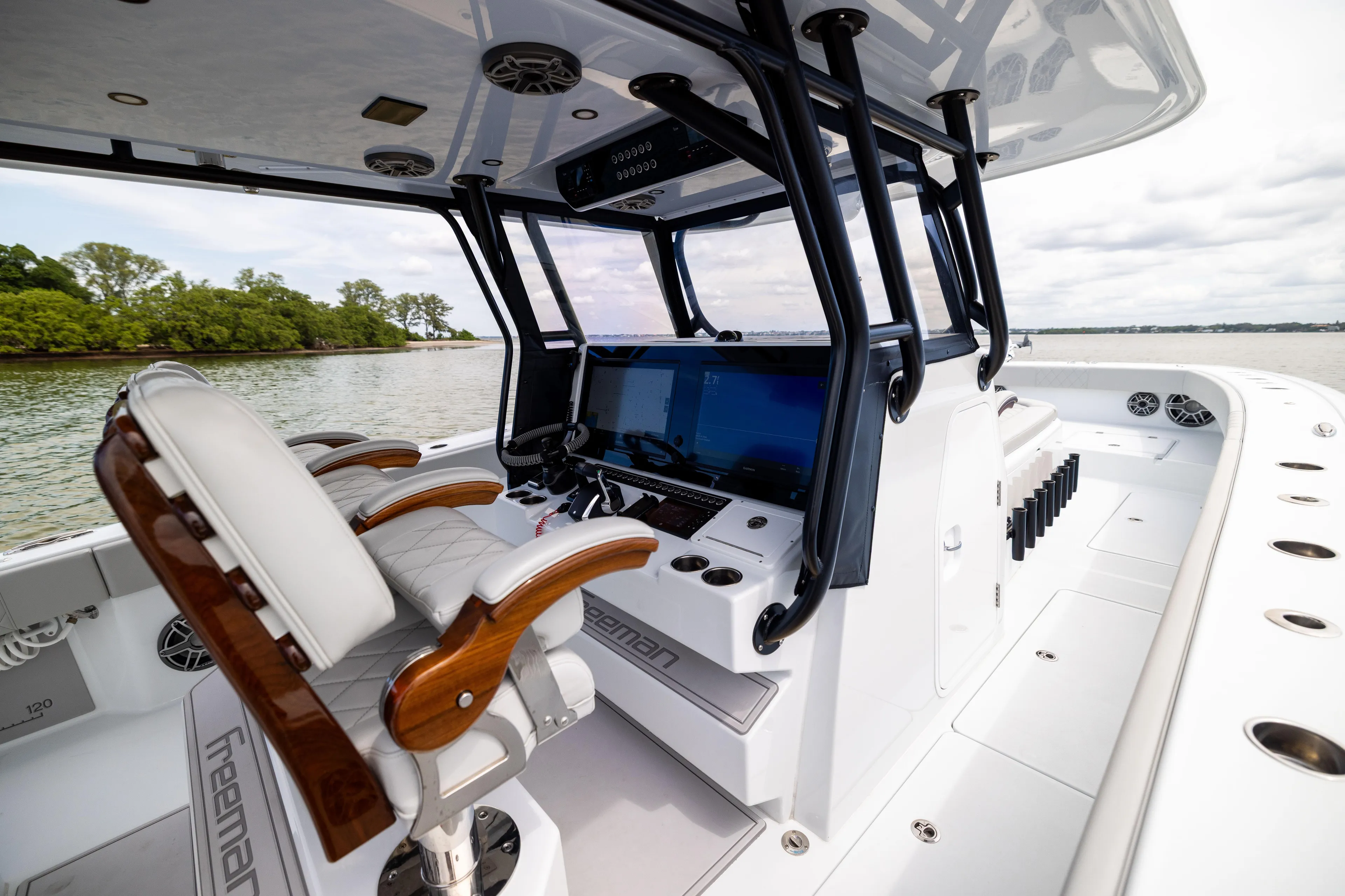  Yacht Photos Pics Luxury interior of 2025 Freeman 42 LR boat with advanced navigation system.