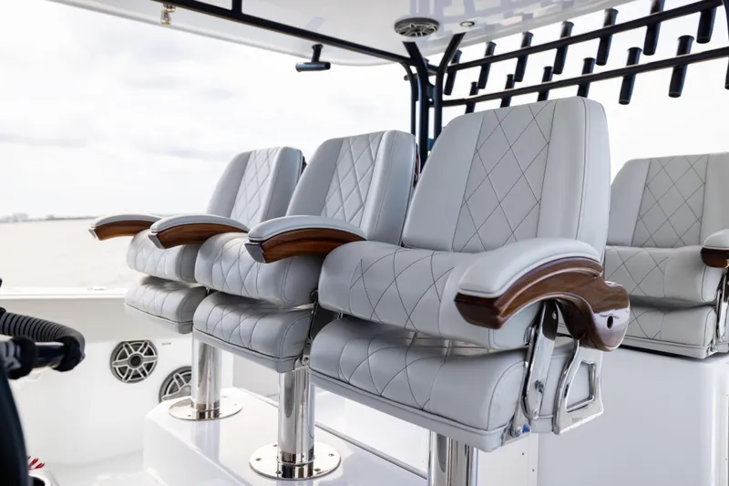  Yacht Photos Pics Luxurious seating on 2025 Freeman 42 LR boat with elegant design and comfort.
