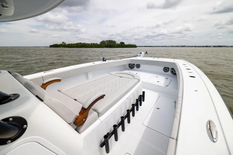  Yacht Photos Pics 2025 Freeman 42 LR boat interior with seating, rod holders, and ocean view.