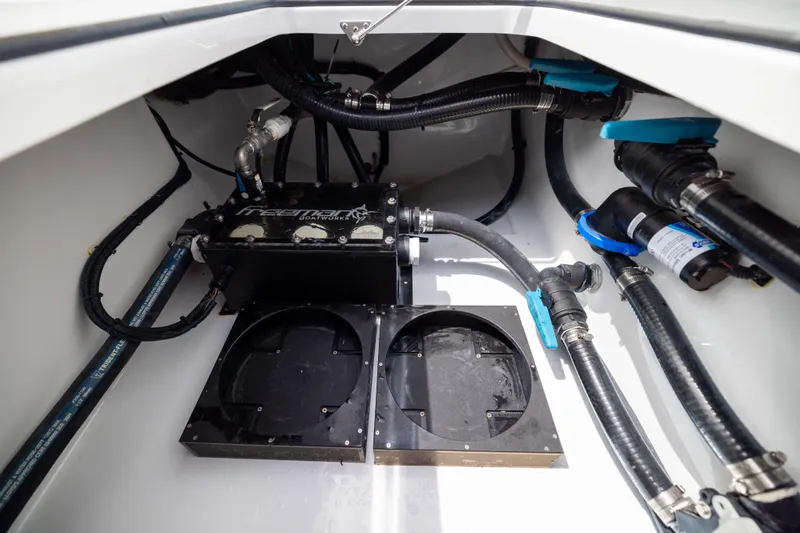  Yacht Photos Pics Engine compartment of 2025 Freeman 42 LR boat with visible hoses and components.