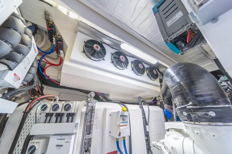  Yacht Photos Pics Engine room of 2021 Riviera 64 Sports Motor Yacht with advanced mechanical systems.