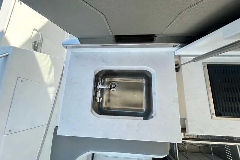  Yacht Photos Pics 2023 Tiara Yachts 38 LS yacht sink with modern countertop design.