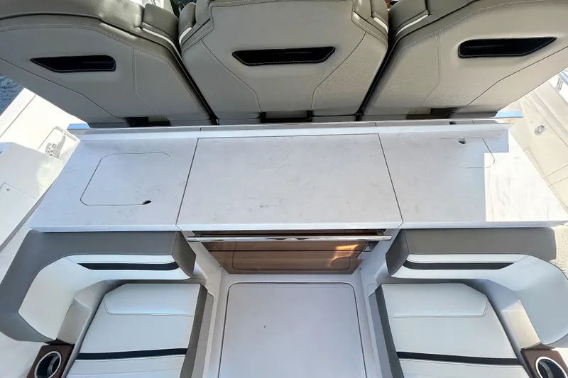  Yacht Photos Pics 2023 Tiara Yachts 38 LS interior with sleek seating and modern design.