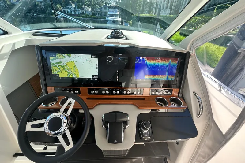  Yacht Photos Pics Helm of 2023 Tiara Yachts 38 LS with advanced navigation displays and controls.