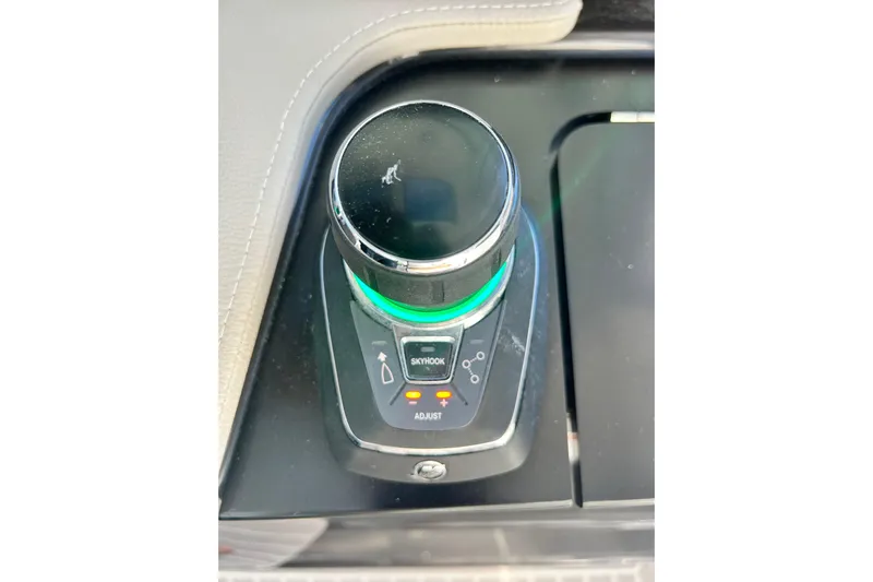  Yacht Photos Pics Control knob on 2023 Tiara Yachts 38 LS dashboard, featuring adjustment and Skyhook options.