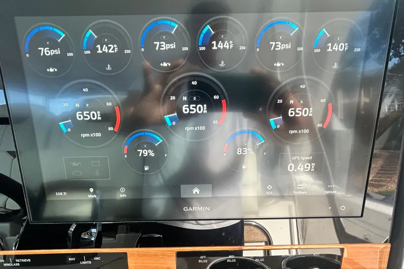  Yacht Photos Pics Dashboard of 2023 Tiara Yachts 38 LS showing engine metrics and GPS speed.