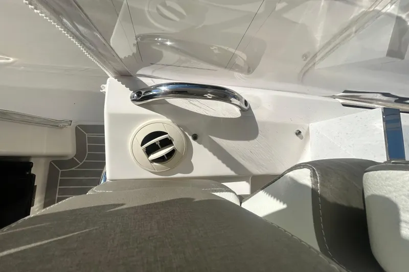  Yacht Photos Pics 2023 Tiara Yachts 38 LS interior detail with chrome handle and air vent.