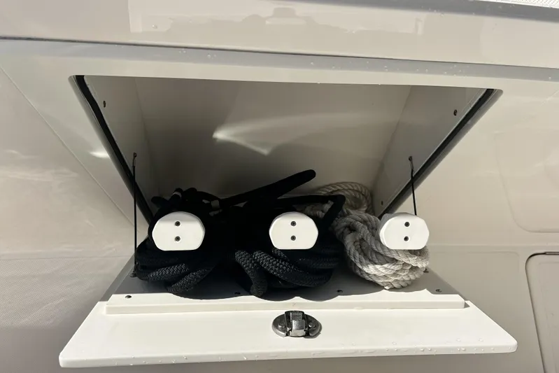  Yacht Photos Pics Storage compartment with ropes on a 2023 Tiara Yachts 38 LS.