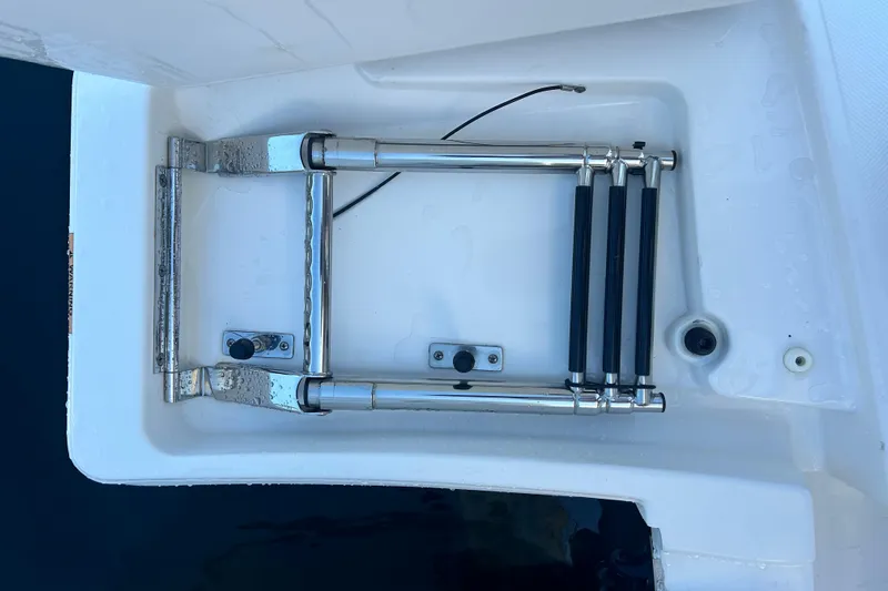  Yacht Photos Pics 2023 Tiara Yachts 38 LS swim platform with retractable ladder.