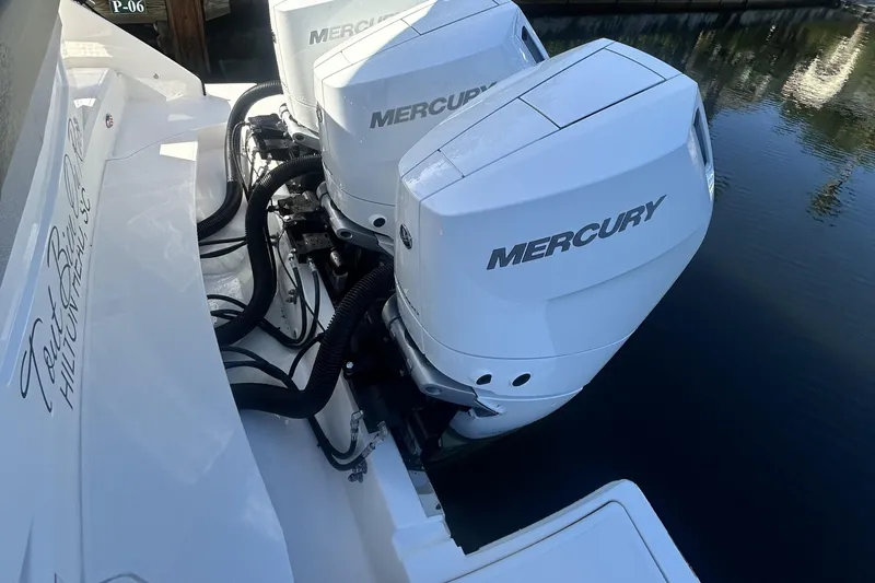  Yacht Photos Pics 2023 Tiara Yachts 38 LS with dual Mercury outboard engines on water.