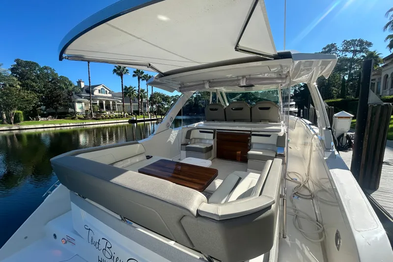  Yacht Photos Pics 2023 Tiara Yachts 38 LS luxury boat with spacious seating and elegant design.