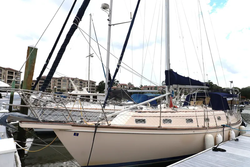 Carpe Diem Yacht Photos Pics Sailboat docked at marina, Island Packet 40, 1995 model, with blue covers.