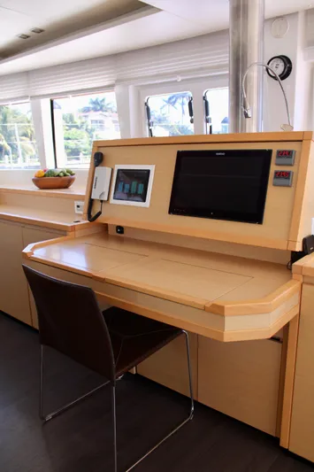 Tiger Lily Yacht Photos Pics Navigation station on a 2015 Lagoon 620 catamaran with modern equipment.