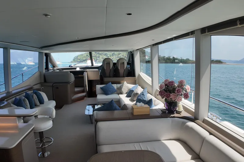 La Mer Yacht Photos Pics Luxurious interior of 2023 Princess Y72 yacht with elegant seating and ocean view.