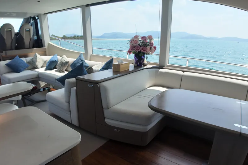 La Mer Yacht Photos Pics Luxurious interior of 2023 Princess Y72 yacht with ocean view and elegant seating.