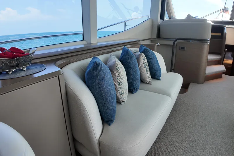 La Mer Yacht Photos Pics Luxurious interior of 2023 Princess Y72 yacht with elegant seating and ocean view.