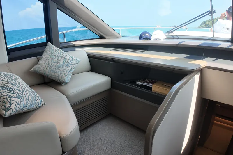 La Mer Yacht Photos Pics Luxurious interior of 2023 Princess Y72 yacht with elegant seating and ocean view.