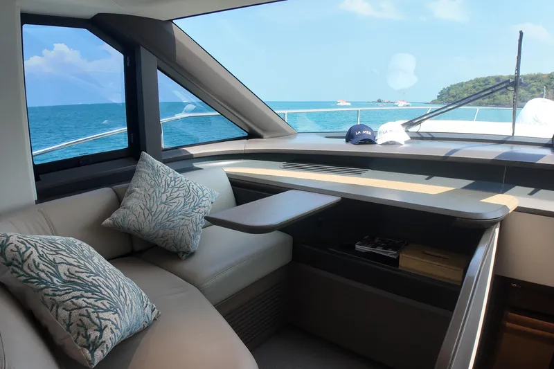 La Mer Yacht Photos Pics Luxurious interior of 2023 Princess Y72 yacht with ocean view and plush seating.