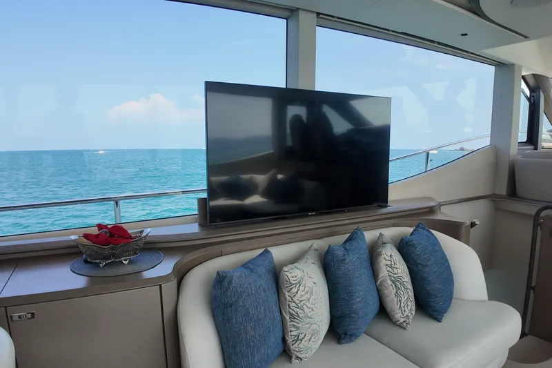 La Mer Yacht Photos Pics Luxurious interior of 2023 Princess Y72 yacht with ocean view and plush seating.