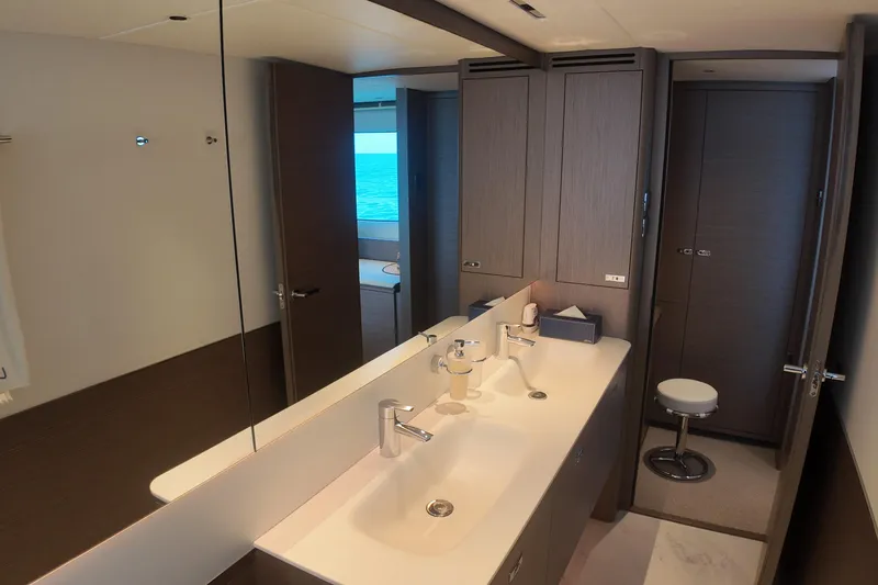 La Mer Yacht Photos Pics Luxurious bathroom interior on 2023 Princess Y72 yacht with modern fixtures and ocean view.