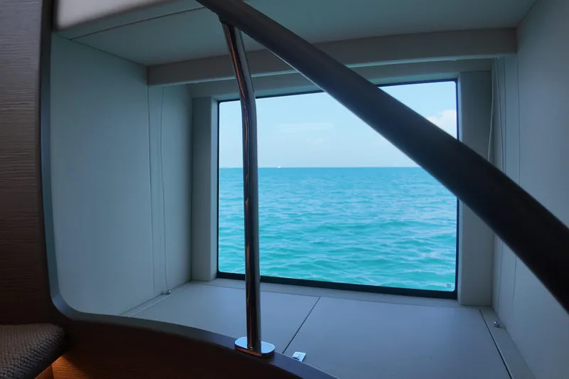 La Mer Yacht Photos Pics Interior view from 2023 Princess Y72 yacht, showcasing ocean through window.