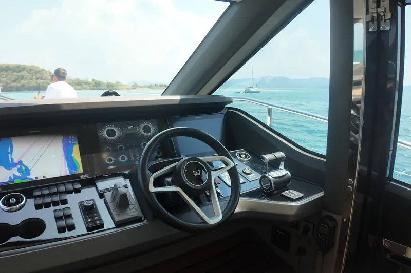 La Mer Yacht Photos Pics Helm of 2023 Princess Y72 yacht with navigation screens and ocean view.