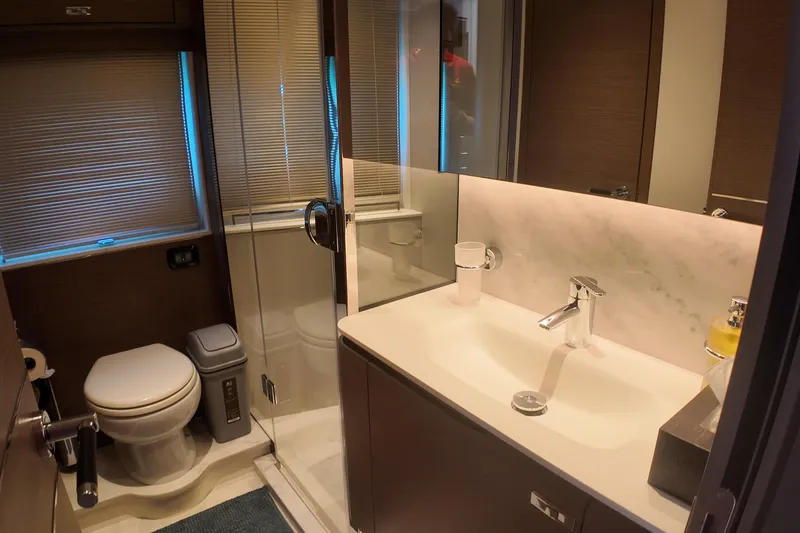 La Mer Yacht Photos Pics Luxurious bathroom in 2023 Princess Y72 yacht with modern fixtures and elegant design.