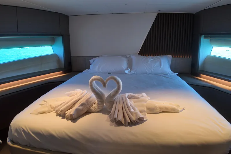 La Mer Yacht Photos Pics Luxurious Princess Y72 yacht bedroom with swan towel art, 2023 model.
