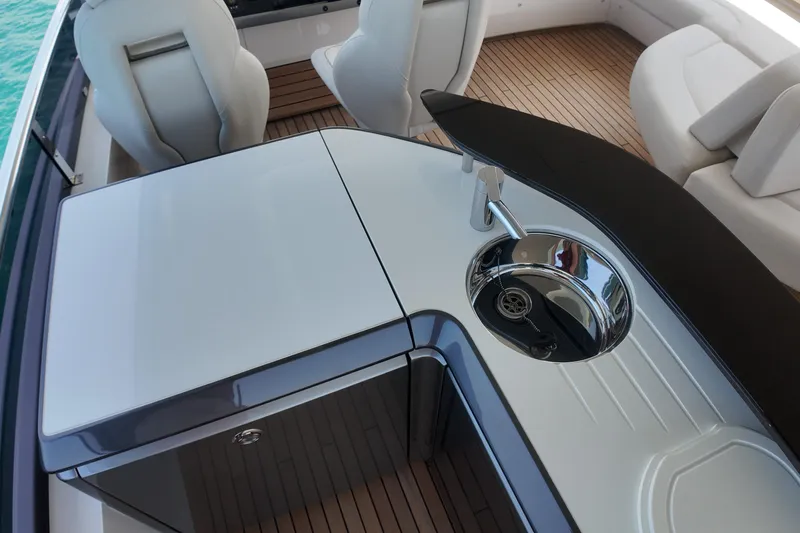 La Mer Yacht Photos Pics Luxury yacht Princess Y72 2023 interior with sleek sink and seating area.