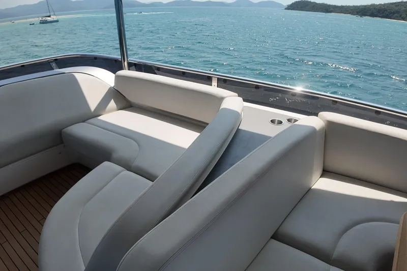 La Mer Yacht Photos Pics Luxurious seating on 2023 Princess Y72 yacht with ocean view.