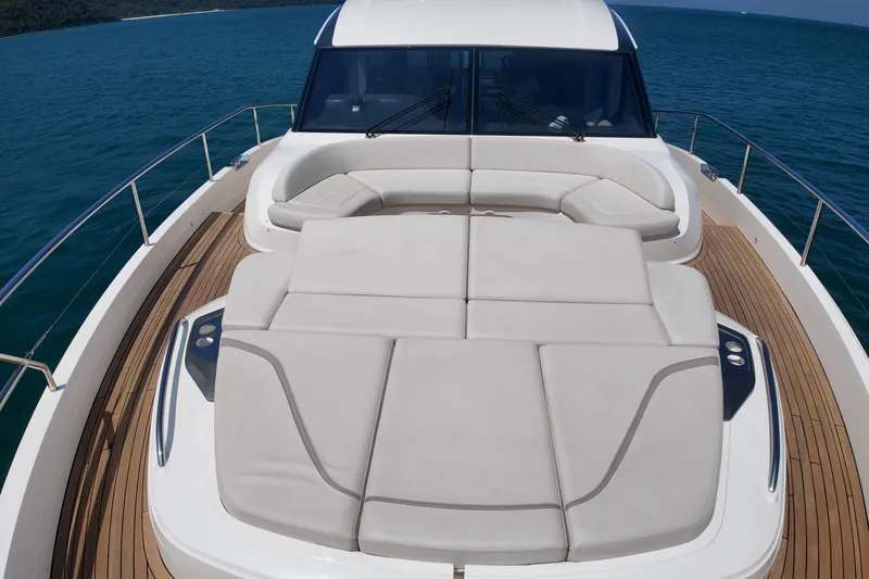 La Mer Yacht Photos Pics Luxurious 2023 Princess Y72 yacht deck with spacious seating and ocean view.