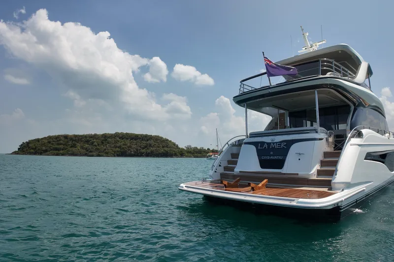 La Mer Yacht Photos Pics Luxurious 2023 Princess Y72 yacht "La Mer" cruising in serene waters.