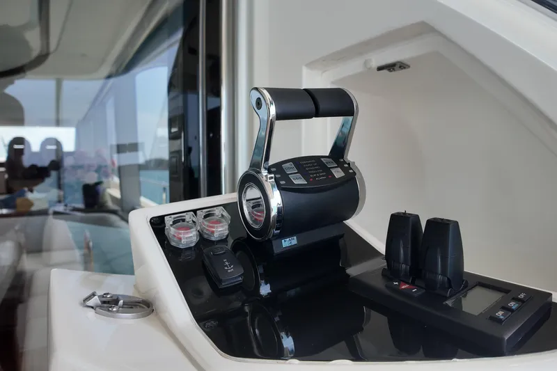 La Mer Yacht Photos Pics Control panel of 2023 Princess Y72 yacht, featuring modern throttle and navigation controls.