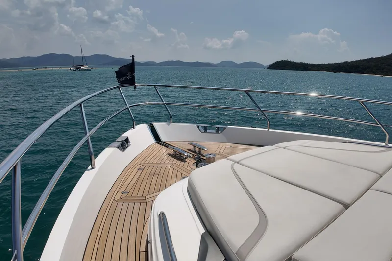 La Mer Yacht Photos Pics Luxurious 2023 Princess Y72 yacht deck with scenic ocean view.