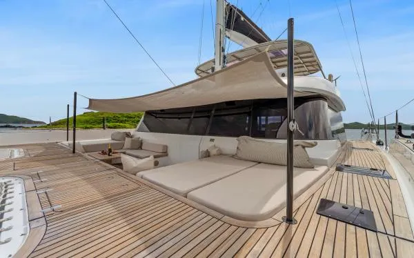 Ocean Vibes Yacht Photos Pics Luxurious Sunreef 70 yacht deck with sunbeds and canopy, 2020 model.