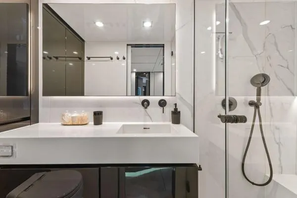 Ocean Vibes Yacht Photos Pics Modern bathroom interior on Sunreef 70 yacht, 2020 model, featuring sleek fixtures and elegant design.