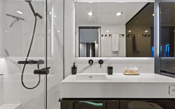 Ocean Vibes Yacht Photos Pics Luxurious bathroom in 2020 Sunreef 70 yacht with modern fixtures and elegant design.