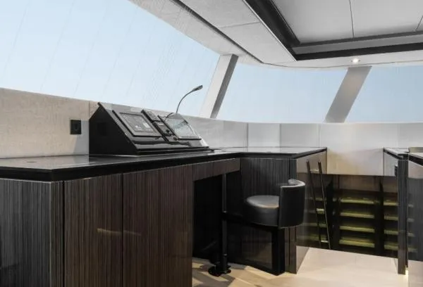 Ocean Vibes Yacht Photos Pics Luxurious interior of 2020 Sunreef 70 yacht with modern helm station and sleek design.