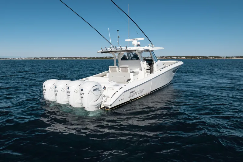 Moore Time Yacht Photos Pics 2023 Pursuit S 428 Sport boat with four Yamaha engines on open water.