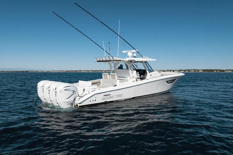 Moore Time Yacht Photos Pics 2023 Pursuit S 428 Sport boat on open water, featuring multiple Yamaha engines.